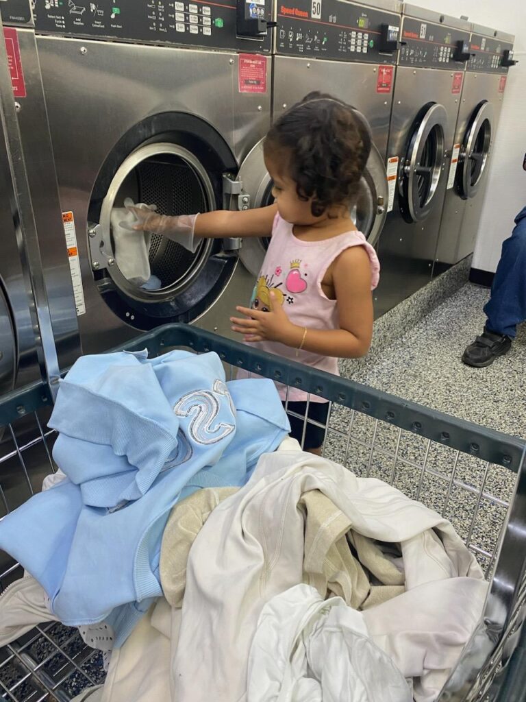 Tia in coin laundry near Kissimmee